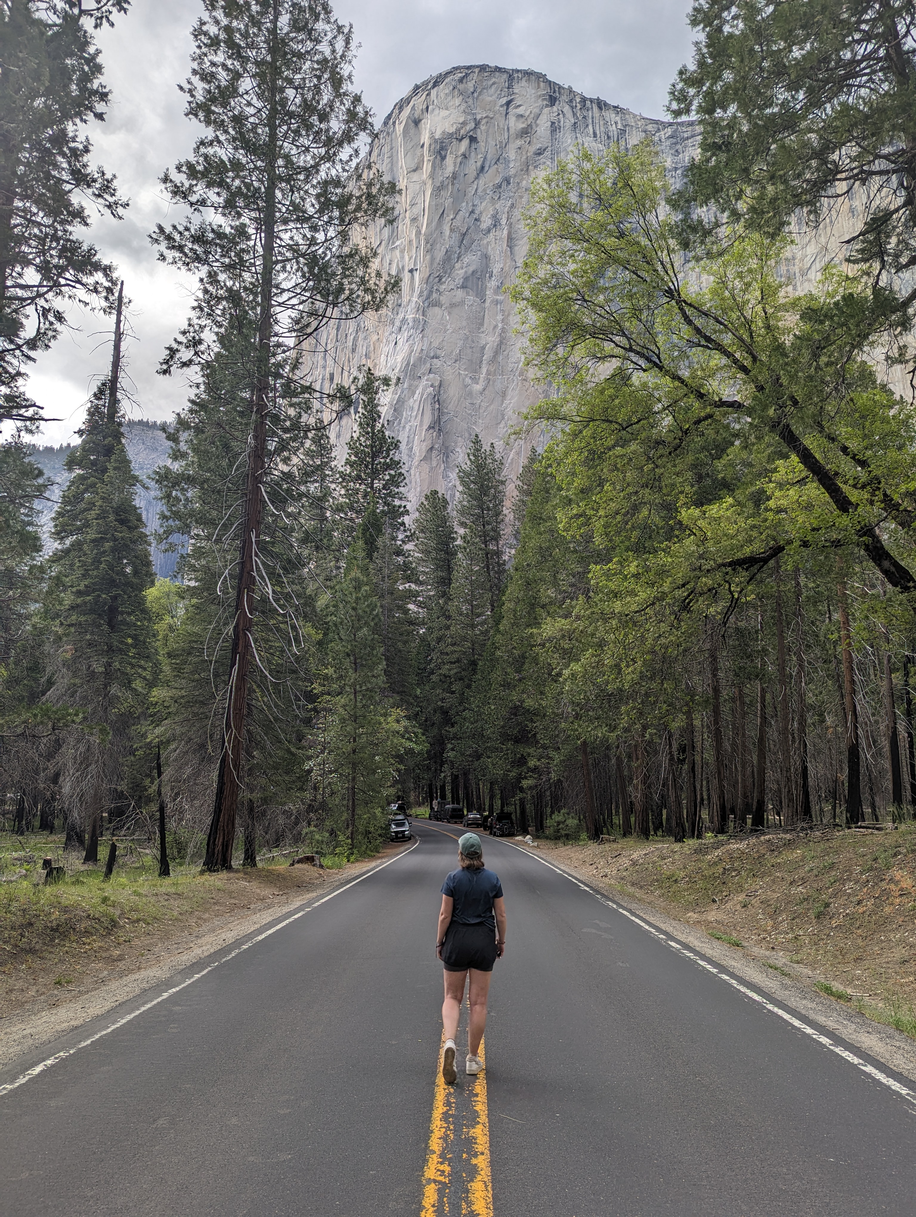 Blog author walking along a quiet road leading to El Capitan in Yosemite National Park